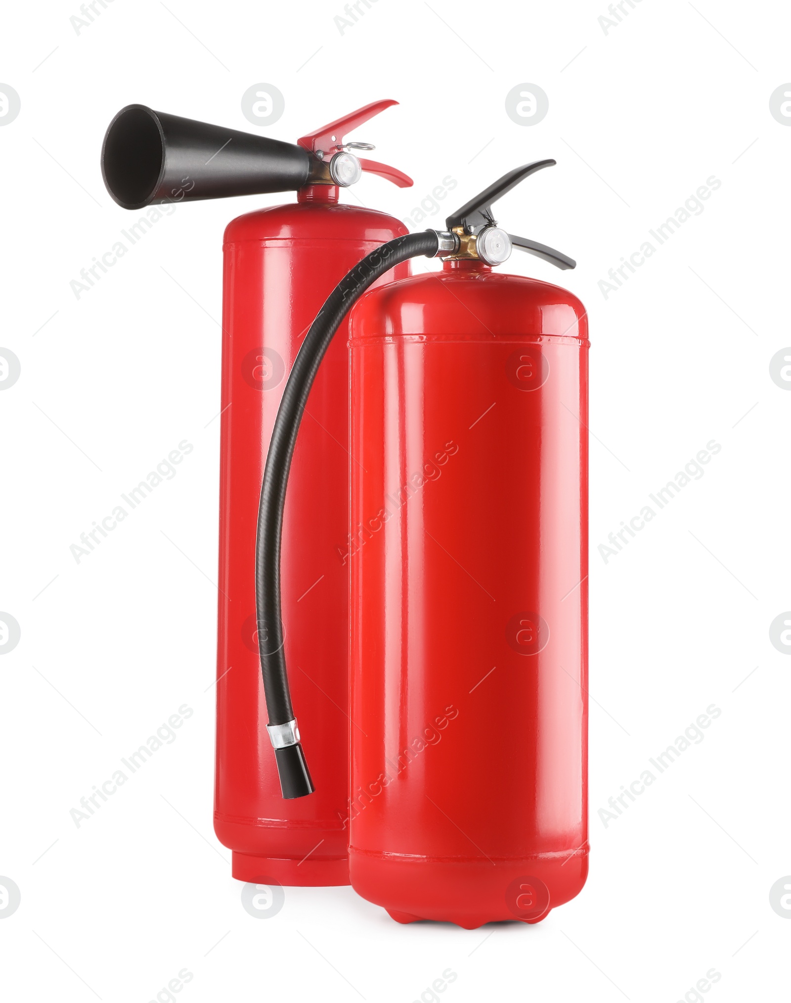 Photo of Two red fire extinguishers on white background