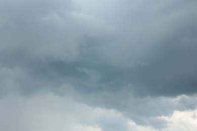 Photo of Sky with heavy rainy clouds. Stormy weather