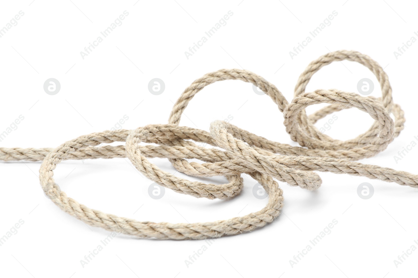 Photo of Hemp rope isolated on white. Organic material