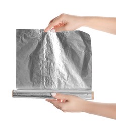 Photo of Woman holding roll of aluminum foil on white background, closeup