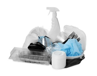 Photo of Pile of different plastic items on white background