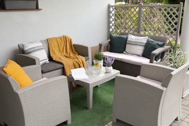 Photo of Beautiful terrace with comfortable furniture in yard