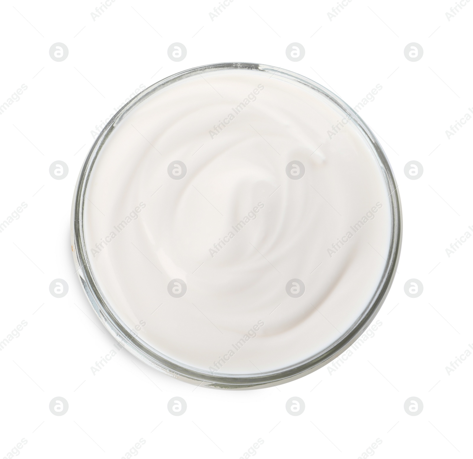 Photo of Glass bowl with delicious organic yogurt isolated on white, top view