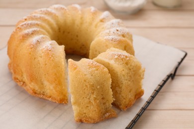 Photo of Delicious freshly baked sponge cake on table, closeup