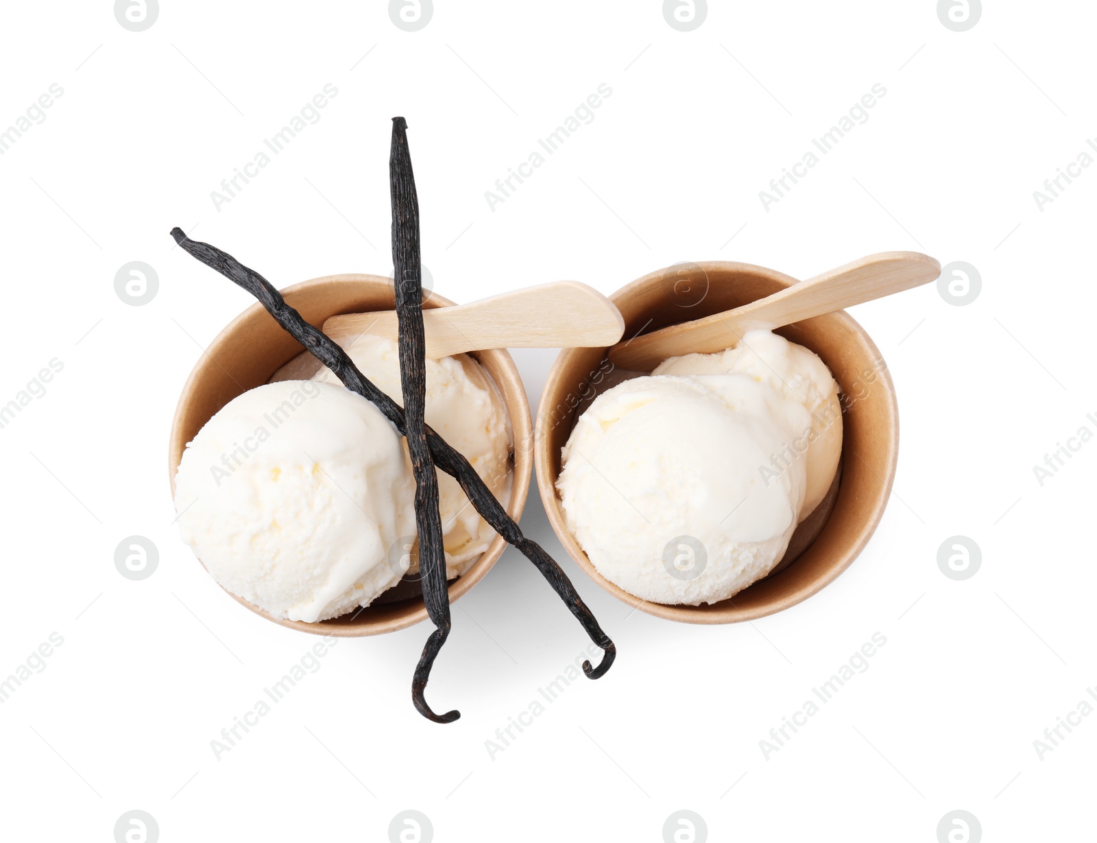 Photo of Paper cups with delicious ice cream and vanilla pods isolated on white, top view