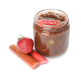 Tasty rhubarb jam in jar, cut stems and strawberry on white background