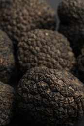 Photo of Closeup view of fresh whole black truffles