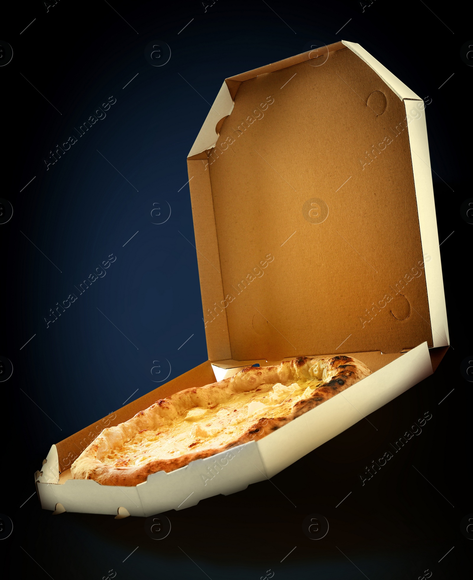 Image of Hot tasty cheese pizza in cardboard box on dark background. Image for menu or poster