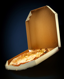 Image of Hot tasty cheese pizza in cardboard box on dark background. Image for menu or poster