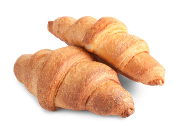 Photo of Tasty fresh crispy croissants isolated on white