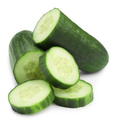 Photo of Halves and slices of long cucumber isolated on white
