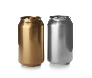 Tin cans with beverages on white background