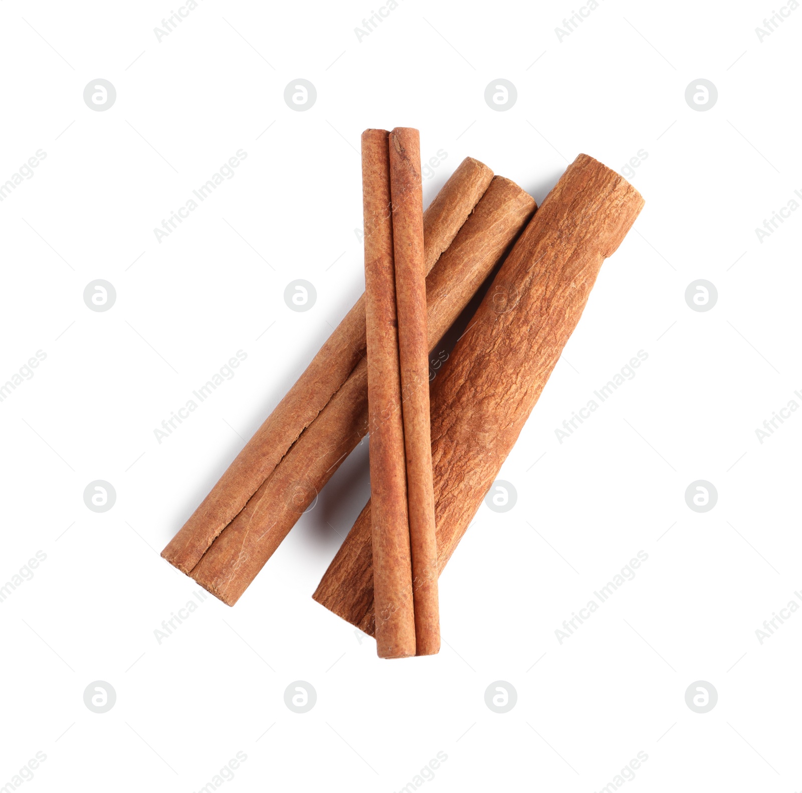 Photo of Cinnamon sticks isolated on white, top view