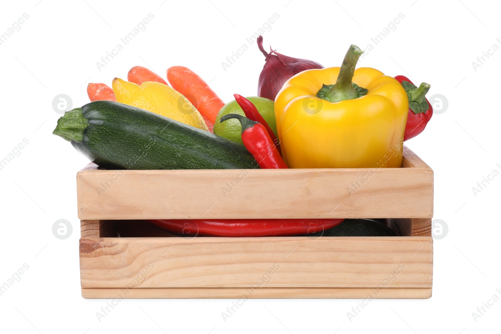 Photo of Fresh ripe vegetables and fruits in wooden crate on white background