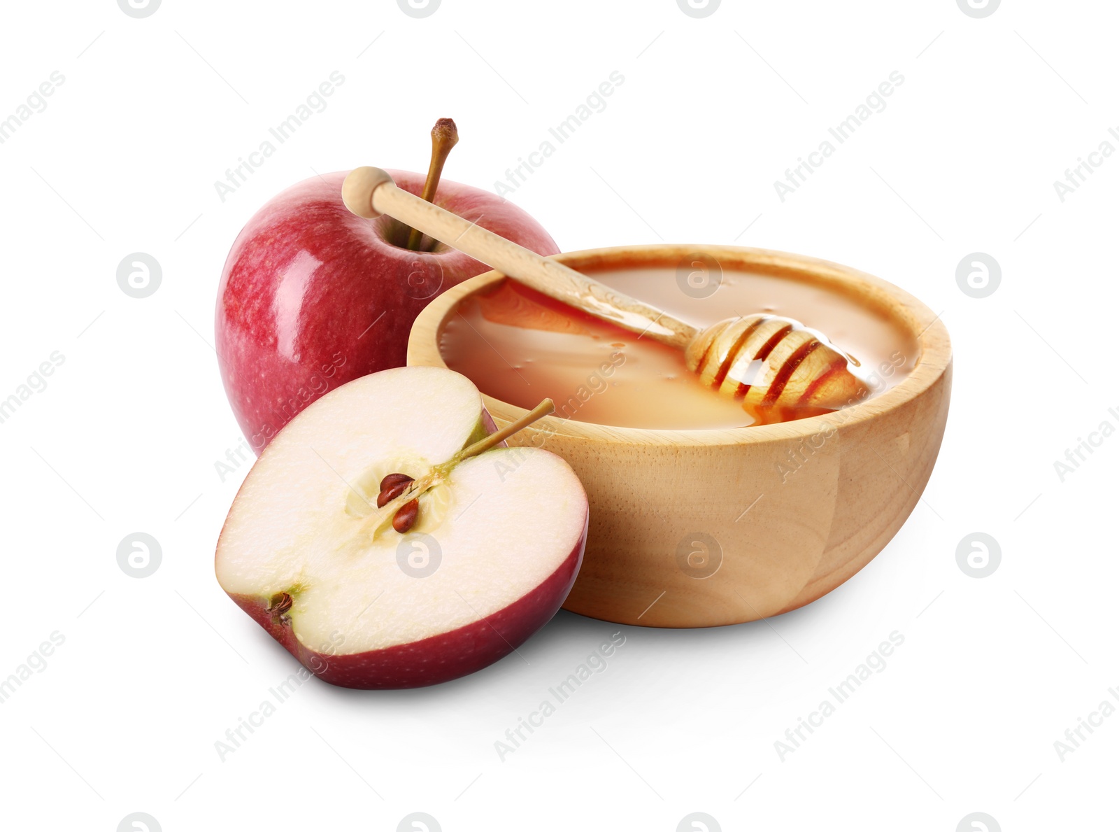 Image of Honey in bowl and apples isolated on white