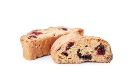 Photo of Slices of tasty cantucci with berry on white background. Traditional Italian almond biscuits