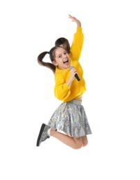 Photo of Little girl with microphone jumping on white background