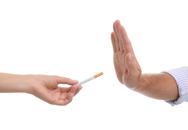 Photo of Stop smoking concept. Man refusing cigarettes on white background, closeup