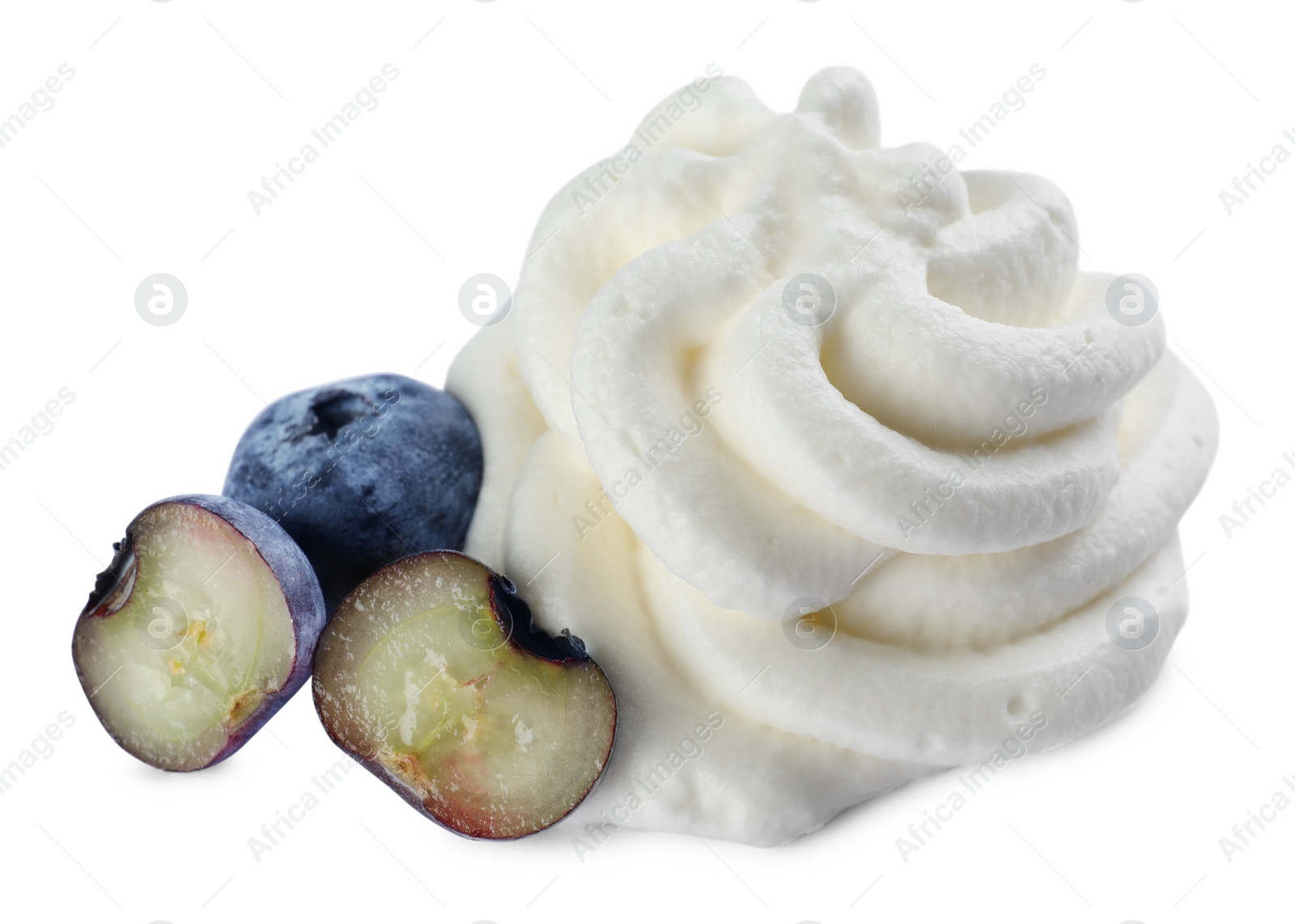 Photo of Delicious fresh whipped cream with blueberries isolated on white