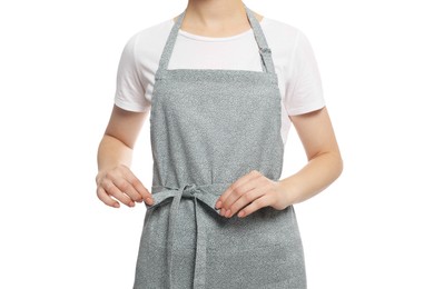 Photo of Woman in clean apron with pattern on white background, closeup