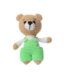 Photo of One crochet bear isolated on white. Children's toy