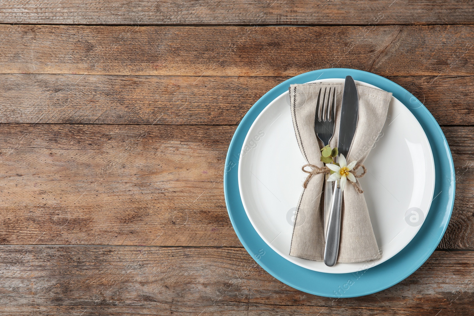 Photo of Beautiful table setting on wooden background, flat lay. Space for text