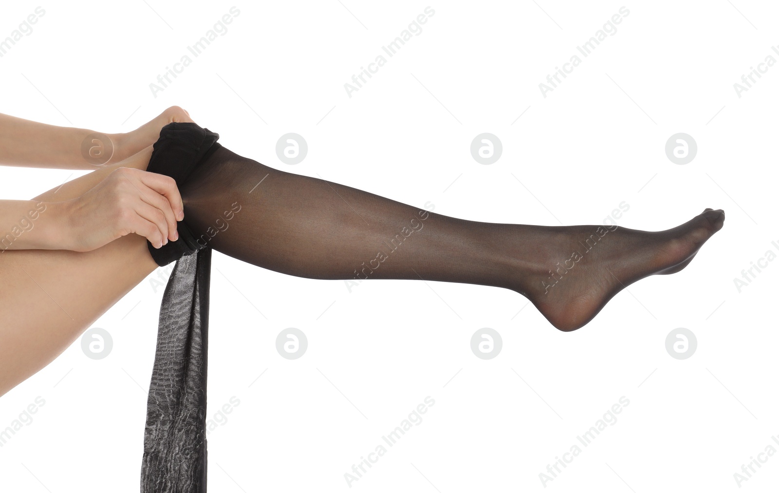 Photo of Woman putting on tights on white background, closeup