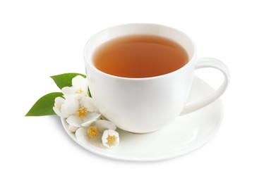 Cup of aromatic jasmine tea and fresh flowers on white background
