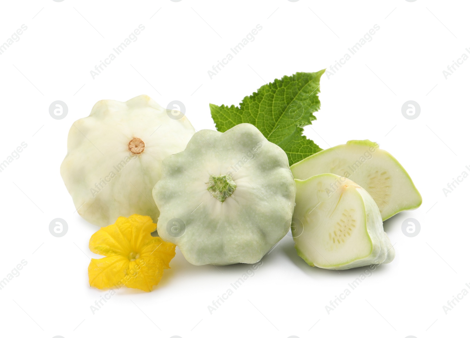 Photo of Fresh ripe pattypan squashes with leaf and flower on white background