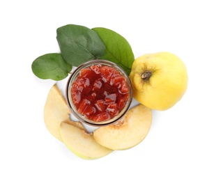 Photo of Delicious quince jam and fruits isolated on white, top view