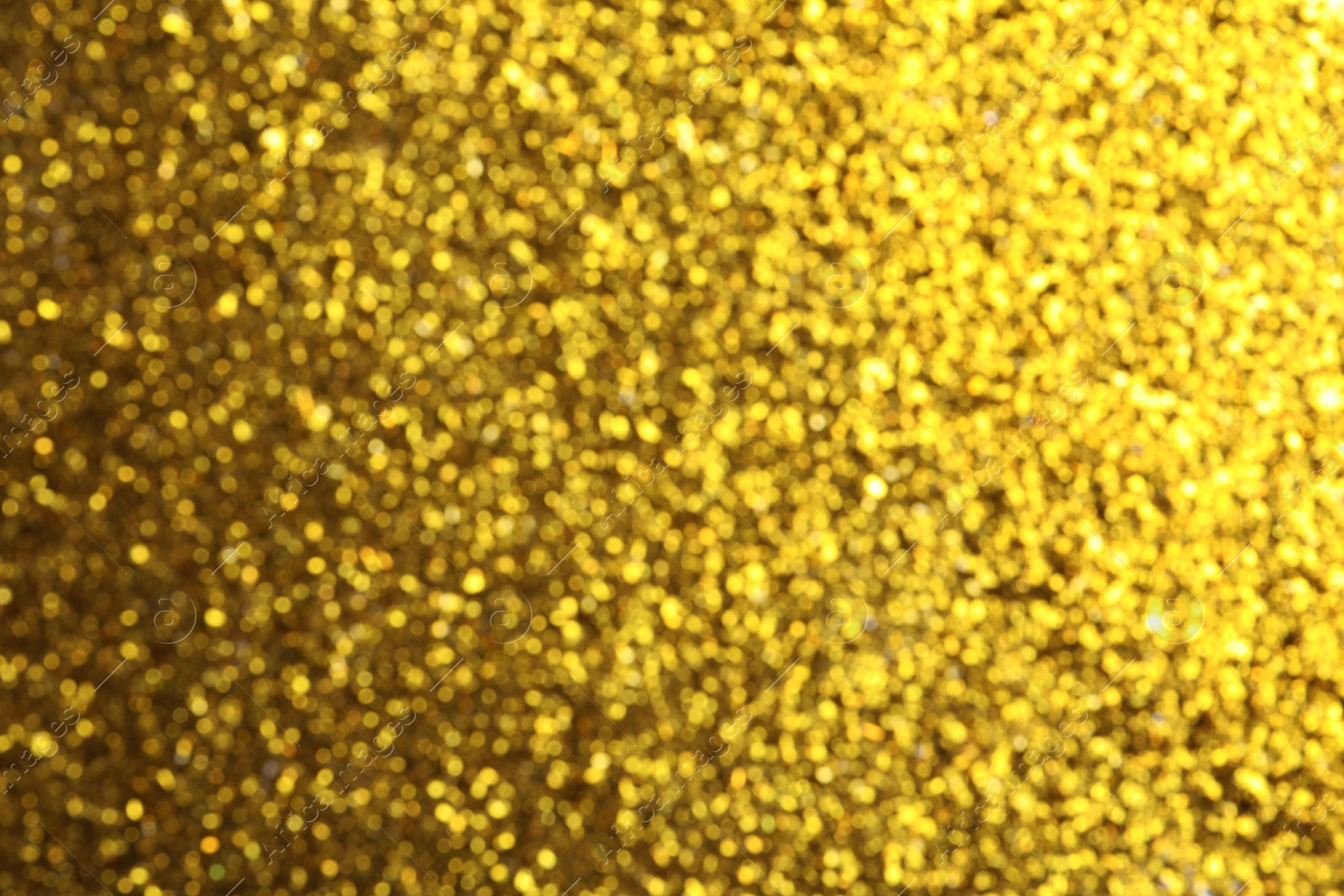 Photo of Shiny golden background with magical bokeh effect