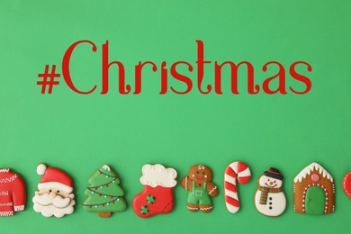 Image of Hashtag Christmas and different gingerbread cookies on green background, flat lay