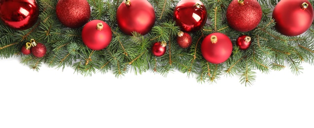 Photo of Fir tree branches with Christmas decoration on white background, flat lay