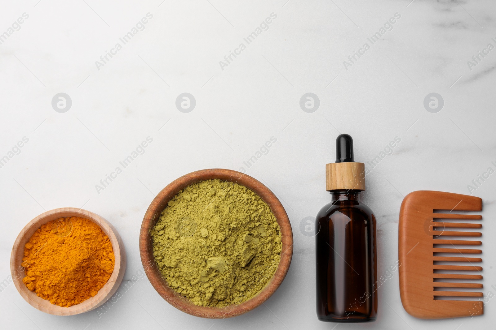 Photo of Flat lay composition with henna and turmeric powder on white marble table, space for text