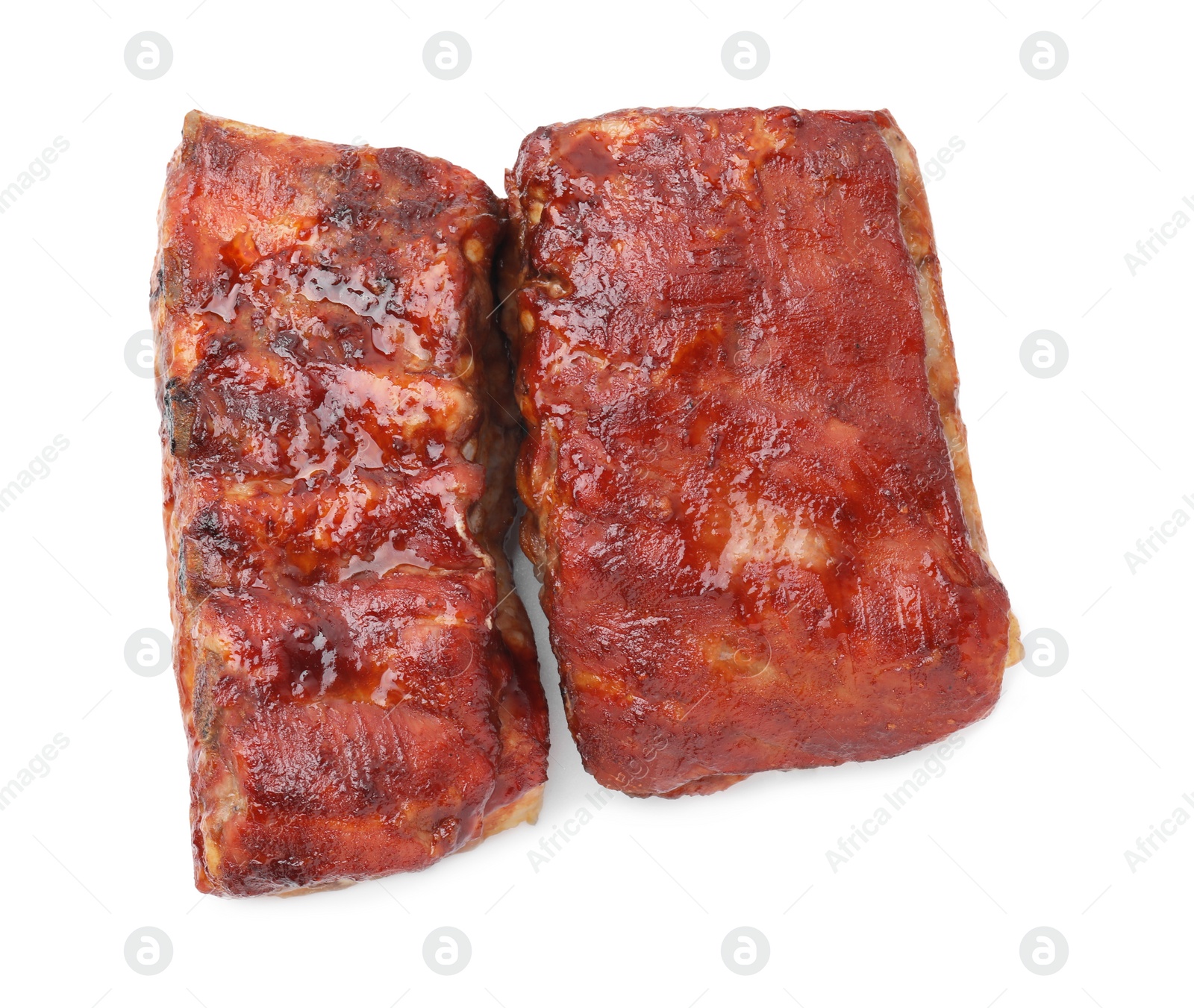 Photo of Tasty roasted pork ribs isolated on white, top view