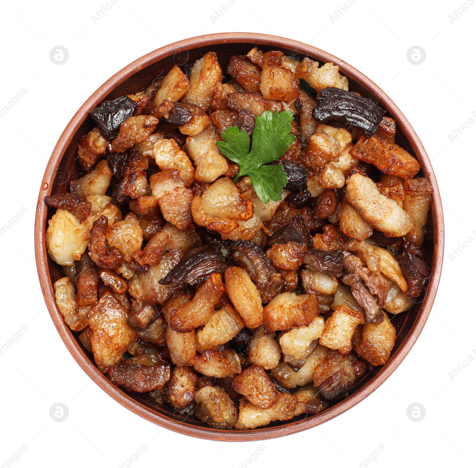 Photo of Tasty fried cracklings parsley in bowl on white background, top view. Cooked pork lard