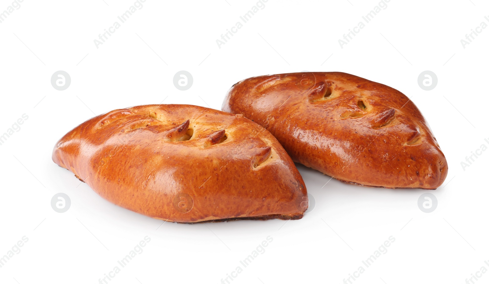 Photo of Two delicious baked patties on white background