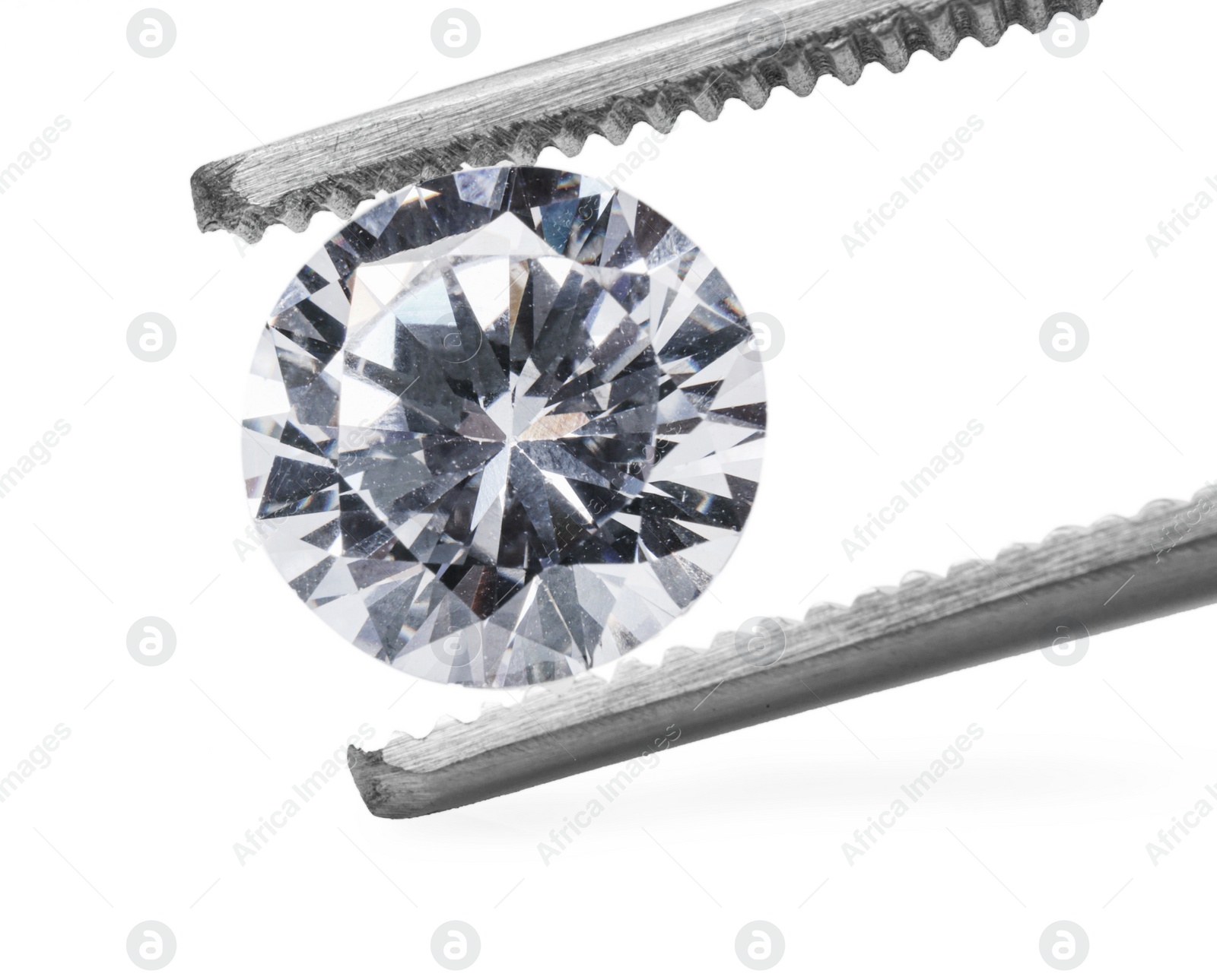 Photo of Tweezers with beautiful shiny diamond isolated on white