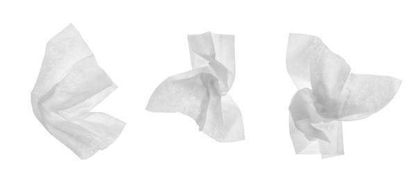 Image of Set with used crumpled paper tissues on white background. Banner design