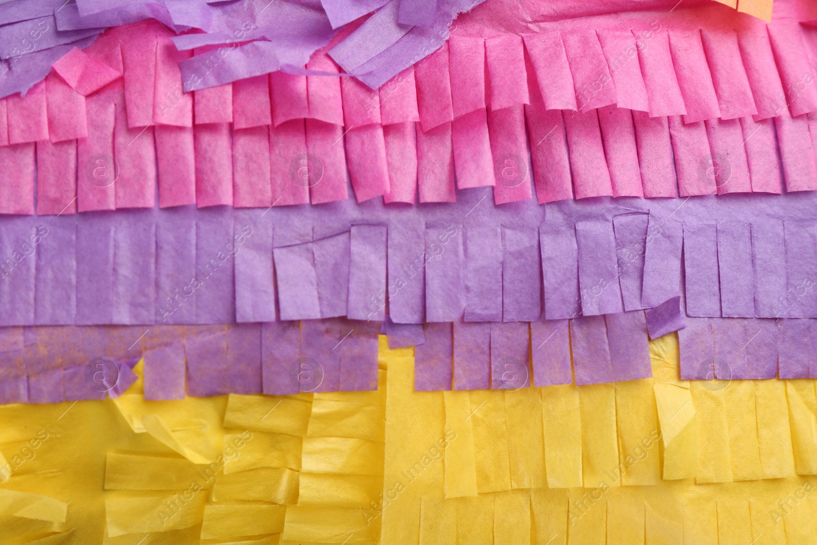 Photo of Cut tissue paper in different colors as background