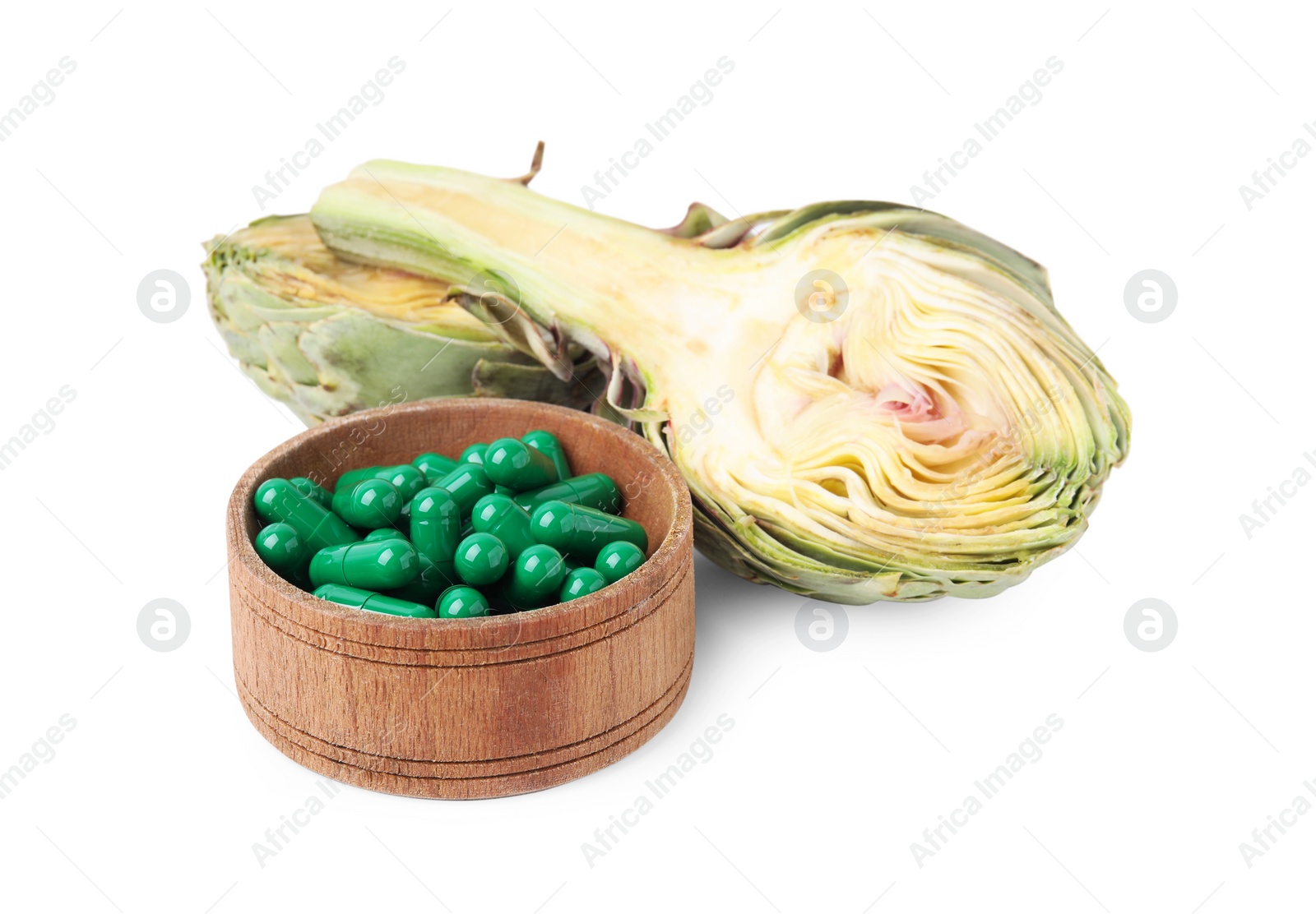 Photo of Fresh artichoke and pills isolated on white