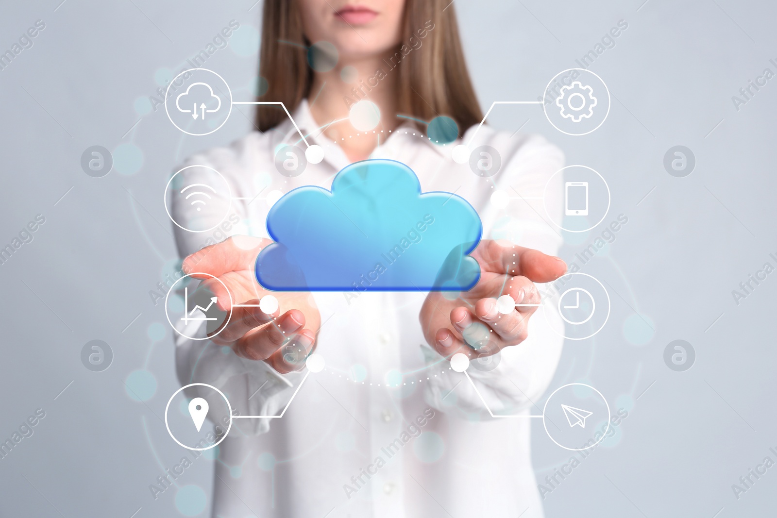 Image of Young woman demonstrating digital cloud with icons on grey background, closeup. Modern technology