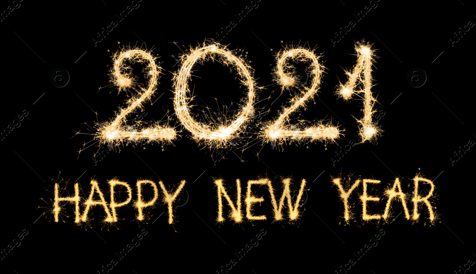 Image of Happy new year card. 2021 and text silhouettes made of sparkler on black background