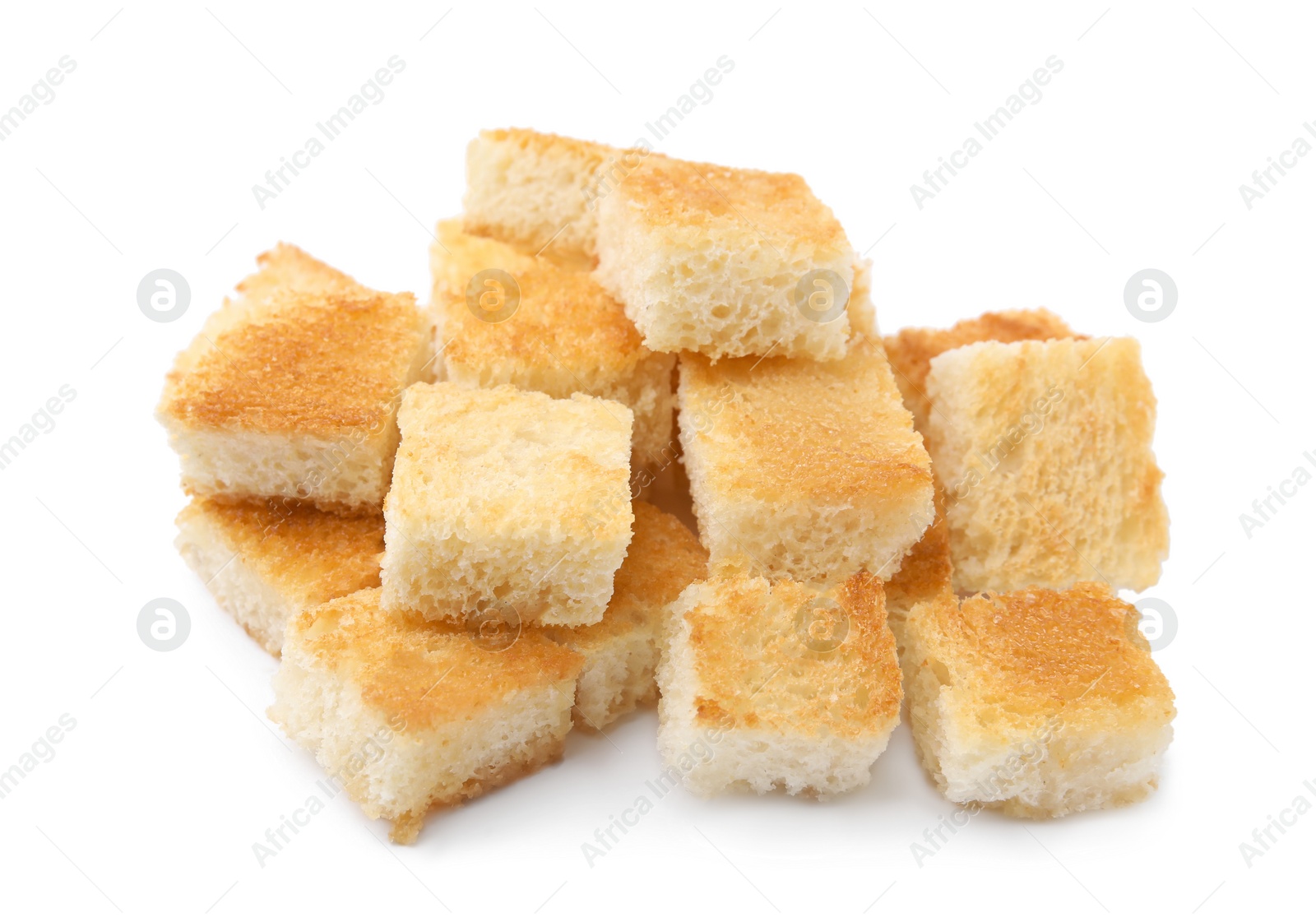 Photo of Pile of delicious crispy croutons on white background