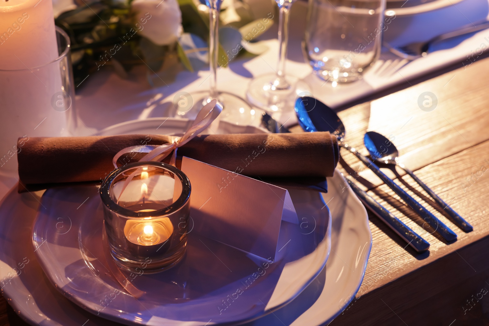 Photo of Festive table setting with beautiful tableware and decor, closeup