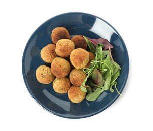 Photo of Delicious falafel balls with herbs on white background, top view