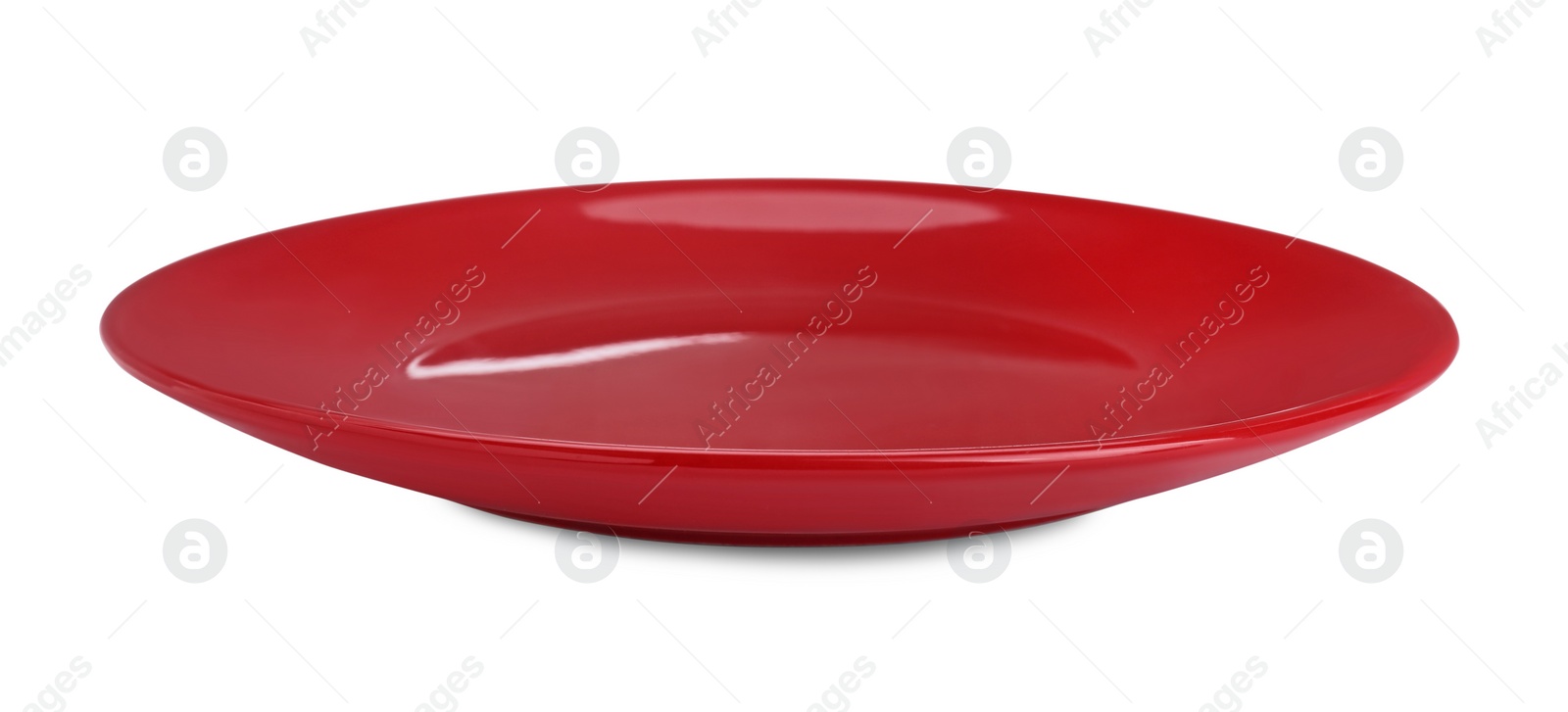 Photo of Empty red ceramic plate isolated on white