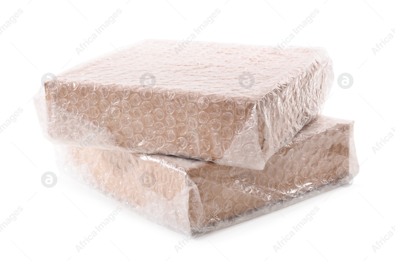 Photo of Cardboard boxes packed in bubble wrap on white background