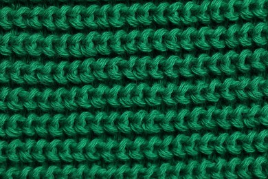 Photo of Texture of soft green fabric as background, top view