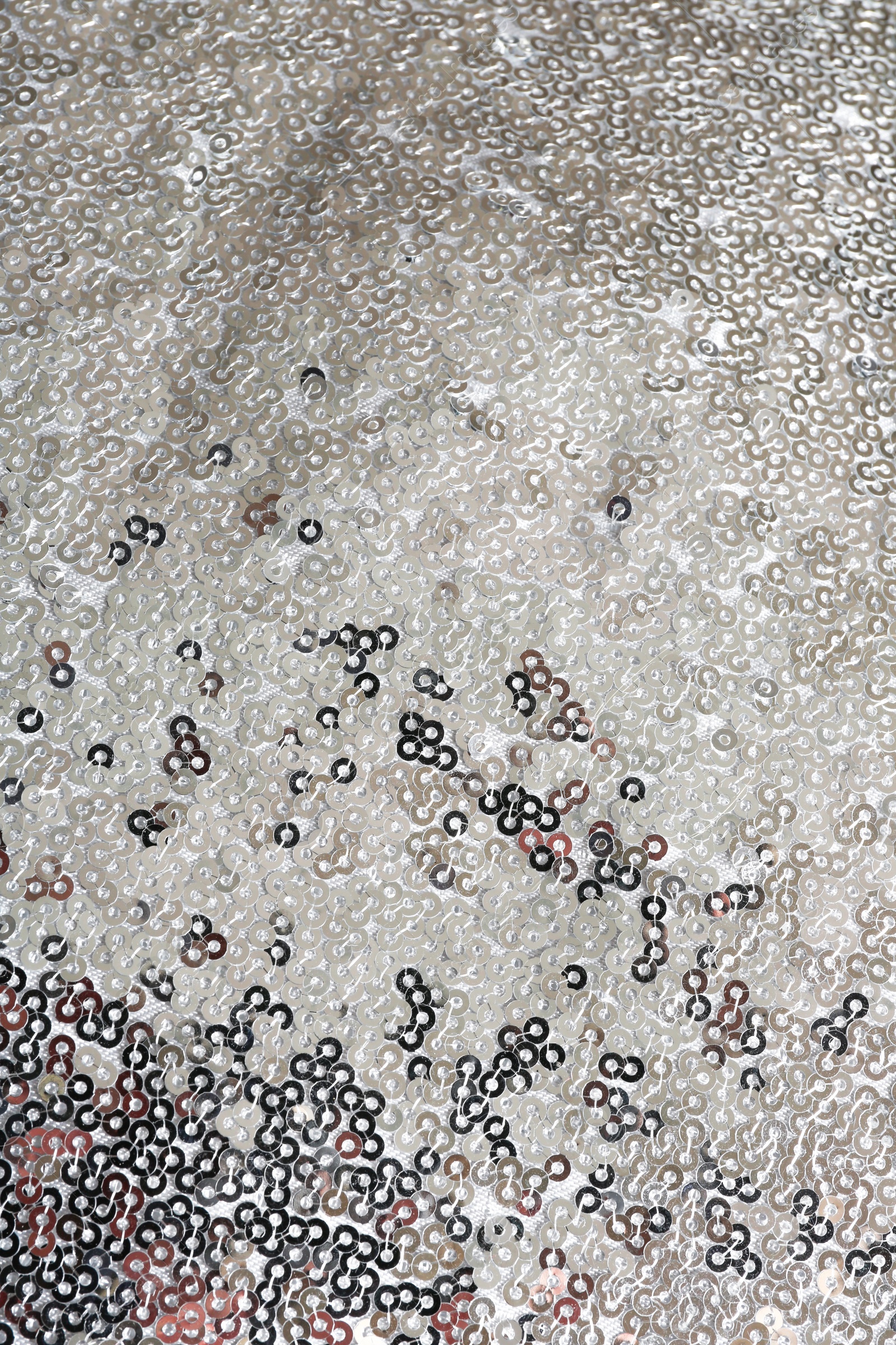 Photo of Fabric with beautiful shiny paillettes as background